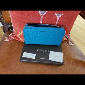 Sold...Gucci women’s wallet turquoise